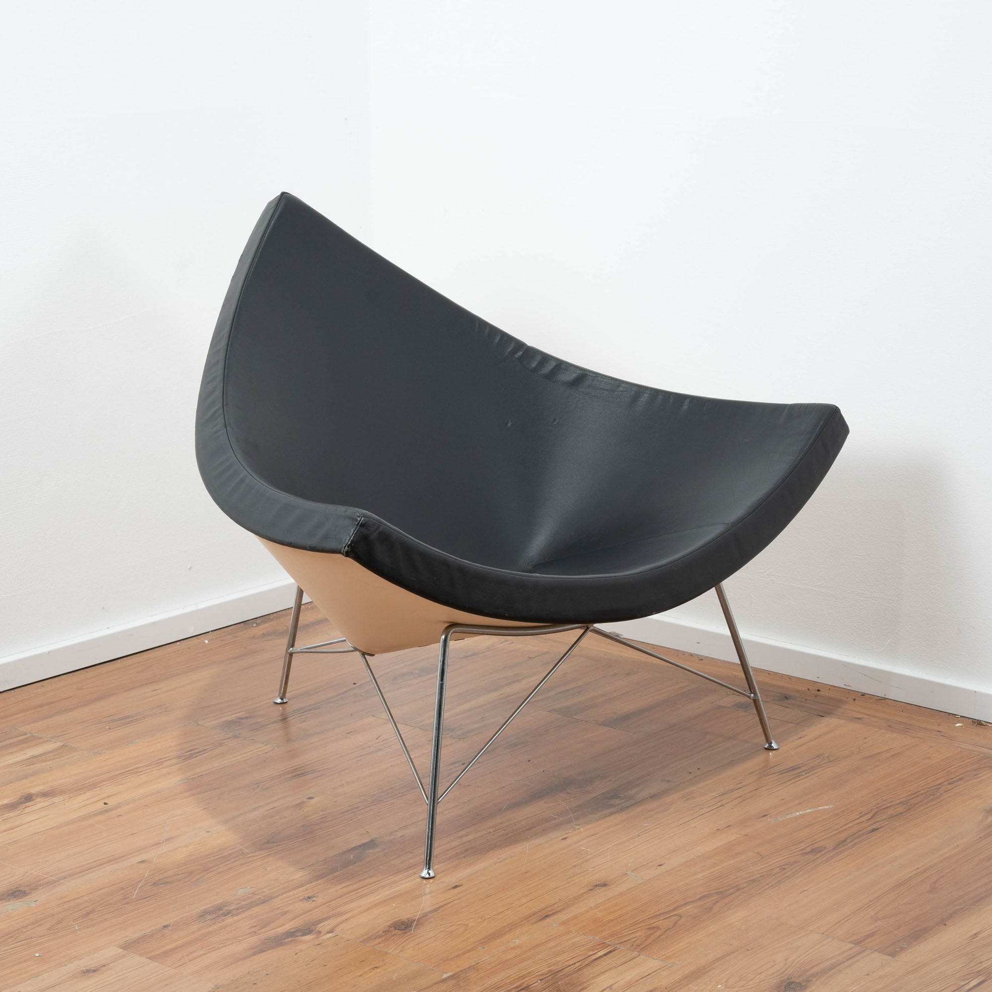 Vitra Coconut Chair von George Nelson - Leder schwarz - Gestell Chrom - Designklassiker