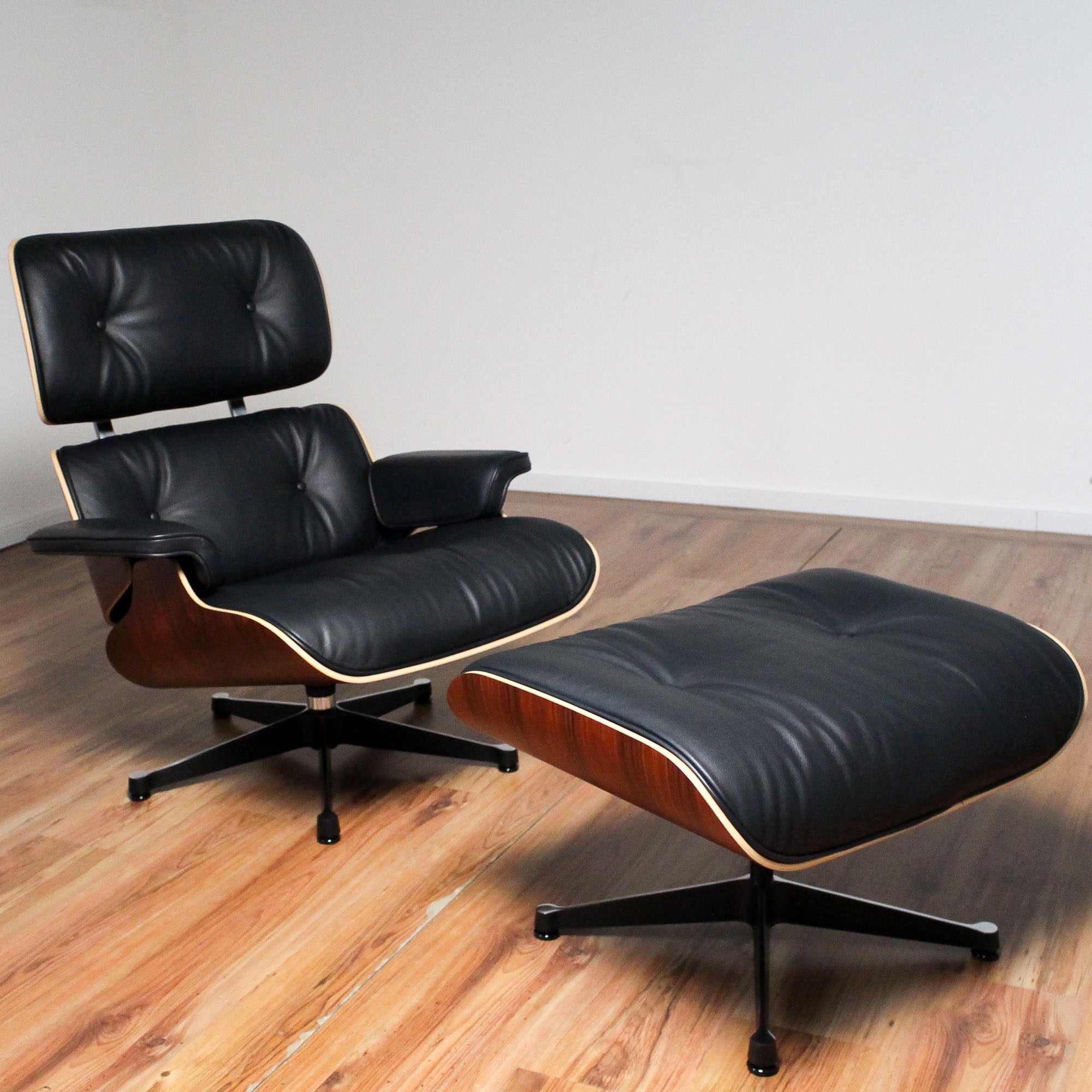 Vitra Lounge Chair - Leder schwarz - Schale Santos Palisander + Ottomane - Sonderangebot